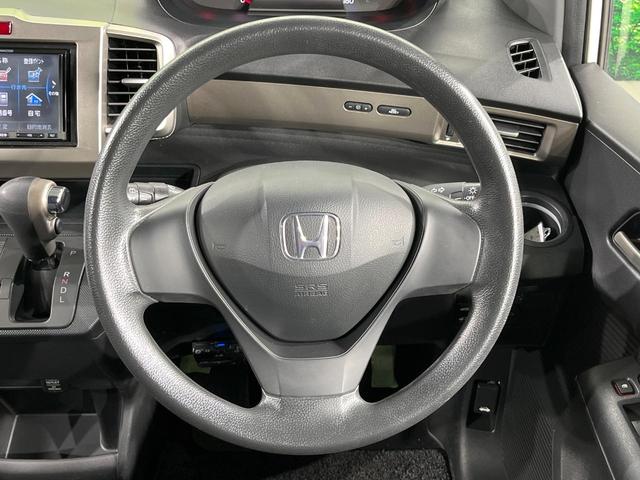 フリードスパイク Ｇ　エアロ　電動スライドドア　ＳＤナビ　禁煙車　スマートキー　ＨＩＤヘッド　ＥＴＣ　オートライト　オートエアコン　純正１５インチアルミ　ＣＤ　ＤＶＤ再生　フルセグ（11枚目）