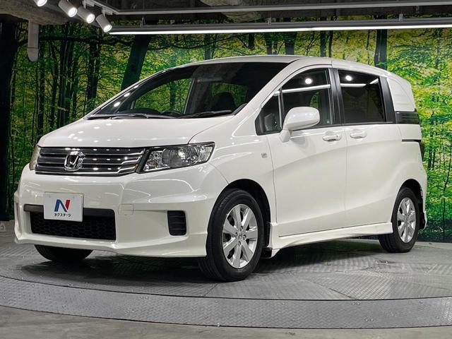 フリードスパイク Ｇ　エアロ　電動スライドドア　ＳＤナビ　禁煙車　スマートキー　ＨＩＤヘッド　ＥＴＣ　オートライト　オートエアコン　純正１５インチアルミ　ＣＤ　ＤＶＤ再生　フルセグ（54枚目）