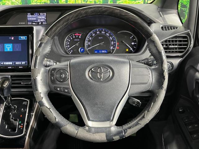 エスクァイア Gi ブラックテーラード 両側電動ドア 純正9型ナビ バックカメラ 衝突軽減装置 禁煙車 ハーフレザーシート ドラレコ スマートキー LEDヘッド ビルトインETC クルコン オートハイビーム 車線逸脱警報 オートライト(12枚目)