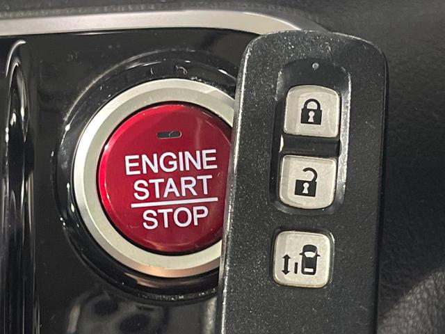 N-BOXカスタム G・Lパッケージ 電動スライドドア 純正ナビ バックカメラ 禁煙車 ドラレコ スマートキー HIDヘッドライト ビルトインETC オートライト オートエアコン 純正14インチアルミ Bluetooth CD DVD再生(8枚目)