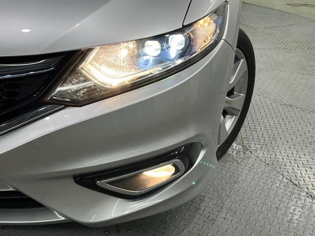 ジェイド ハイブリッドX 純正ナビ バックカメラ 衝突軽減 アダプティブクルーズ 禁煙車 ハーフレザーシート スマートキー LEDヘッド ETC 車線逸脱警報 オートライト オートエアコン ステアリングスイッチ(13枚目)