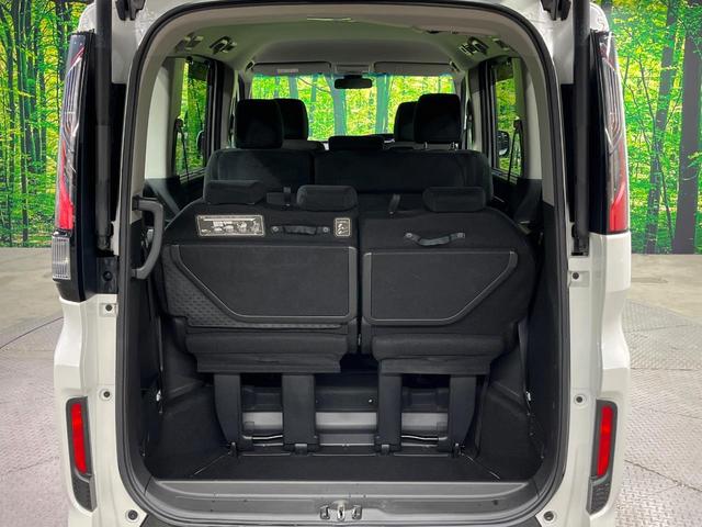 ステップワゴンスパーダ スパーダ 両側電動ドア バックカメラ 衝突軽減装置 レーダークルーズ 禁煙車 スマートキー LEDヘッド ビルトインETC 車線逸脱警報 オートライト デュアルエアコン 純正16インチアルミ Bluetooth(11枚目)