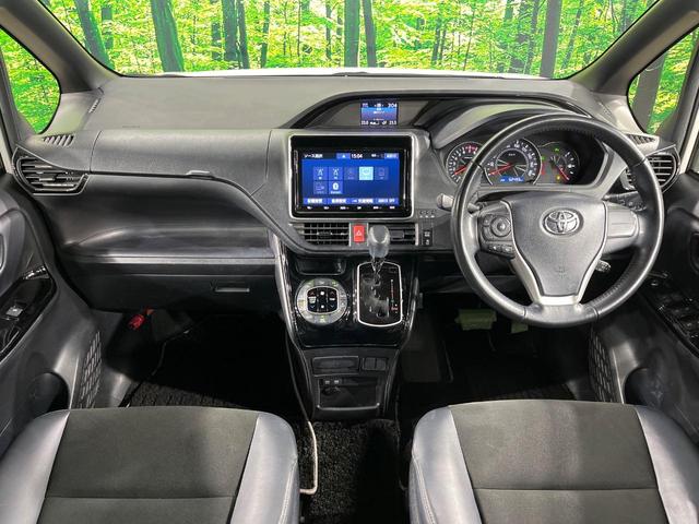 ノア Ｓｉ　ダブルバイビーＩＩ　両側電動ドア　純正９型ナビ　後席モニター　バックカメラ　衝突被害軽減システム　クルコン　禁煙車　ハーフレザーシート　スマートキー　ＬＥＤヘッド　ビルトインＥＴＣ　純正１６インチアルミ（2枚目）