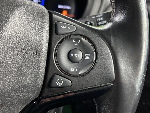 ヴェゼル ハイブリッドRS・ホンダセンシング 純正8インチSDナビ バックカメラ 衝突軽減 レーダークルーズ 禁煙車 ハーフレザーシート シートヒーター スマートキー LEDヘッド ビルトインETC 純正18インチアルミ 車線逸脱警報(6枚目)