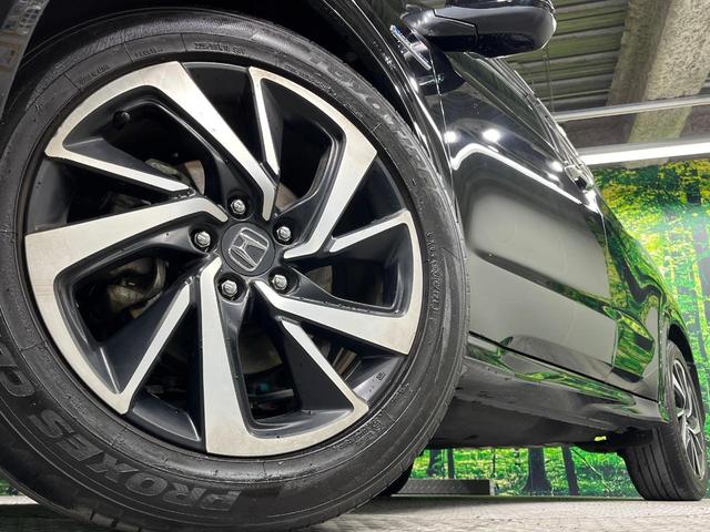 ヴェゼル ハイブリッドRS・ホンダセンシング 純正8インチSDナビ バックカメラ 衝突軽減 レーダークルーズ 禁煙車 ハーフレザーシート シートヒーター スマートキー LEDヘッド ビルトインETC 純正18インチアルミ 車線逸脱警報(13枚目)