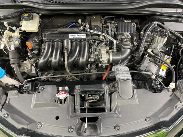 ヴェゼル ハイブリッドRS・ホンダセンシング 純正8インチSDナビ バックカメラ 衝突軽減 レーダークルーズ 禁煙車 ハーフレザーシート シートヒーター スマートキー LEDヘッド ビルトインETC 純正18インチアルミ 車線逸脱警報(18枚目)