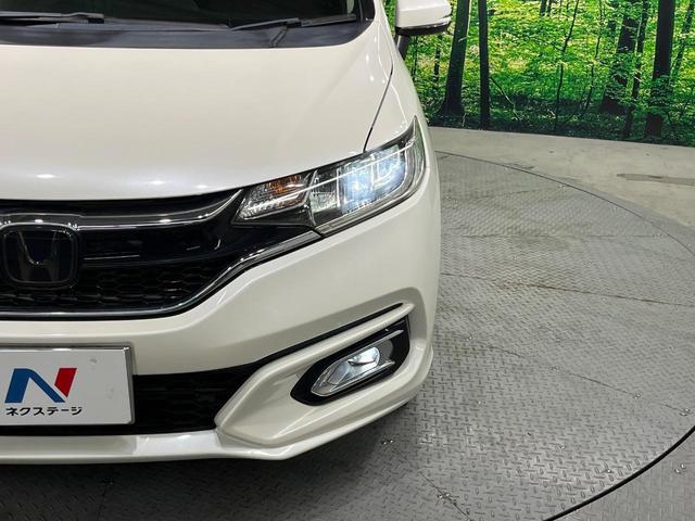 フィット １３Ｇ・Ｌ　ホンダセンシング　カロッツェリアナビ　バックカメラ　衝突軽減　レーダークルーズ　禁煙車　スマートキー　ＬＥＤヘッド　ビルトインＥＴＣ　レーンアシスト　オートライト　オートエアコン　Ｂｌｕｅｔｏｏｔｈ　ＣＤ　ＤＶＤ再生（12枚目）