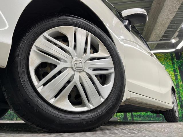 フィット １３Ｇ・Ｌ　ホンダセンシング　カロッツェリアナビ　バックカメラ　衝突軽減　レーダークルーズ　禁煙車　スマートキー　ＬＥＤヘッド　ビルトインＥＴＣ　レーンアシスト　オートライト　オートエアコン　Ｂｌｕｅｔｏｏｔｈ　ＣＤ　ＤＶＤ再生（13枚目）