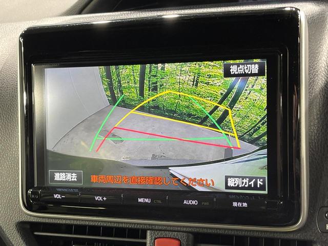 ヴォクシー ハイブリッドＶ　両側電動ドア　純正９インチナビ　バックカメラ　衝突被害軽減システム　レーダークルーズ　禁煙車　スマートキー　ＬＥＤヘッド　ビルトインＥＴＣ　純正１５インチアルミ　車線逸脱警報　シートヒーター（5枚目）