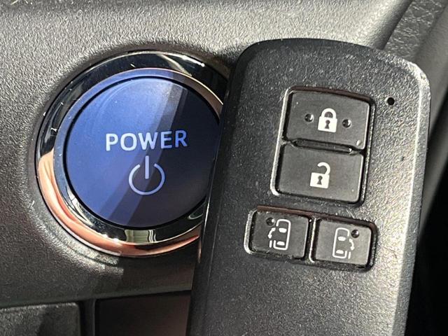 ヴォクシー ハイブリッドＶ　両側電動ドア　純正９インチナビ　バックカメラ　衝突被害軽減システム　レーダークルーズ　禁煙車　スマートキー　ＬＥＤヘッド　ビルトインＥＴＣ　純正１５インチアルミ　車線逸脱警報　シートヒーター（25枚目）