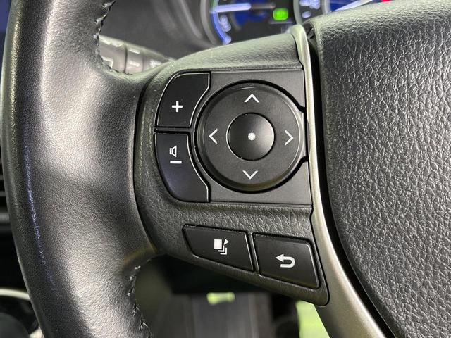 ヴォクシー ハイブリッドＶ　両側電動ドア　純正９インチナビ　バックカメラ　衝突被害軽減システム　レーダークルーズ　禁煙車　スマートキー　ＬＥＤヘッド　ビルトインＥＴＣ　純正１５インチアルミ　車線逸脱警報　シートヒーター（31枚目）