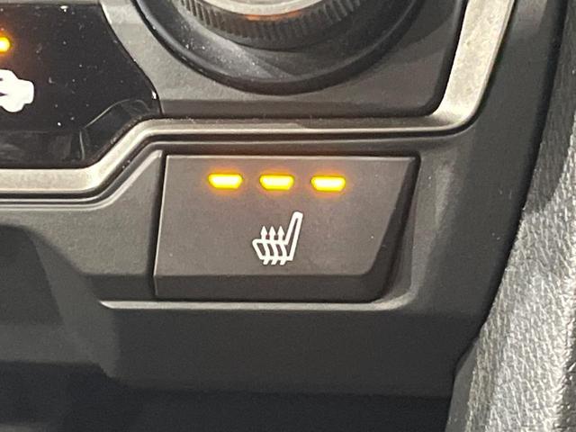 シビック ハッチバック　ホンダセンシング　純正ＳＤナビ　バックカメラ　衝突被害軽減システム　レーダークルーズ　ドラレコ　スマートキー　ＬＥＤヘッド　ビルトインＥＴＣ　純正１８インチアルミ　オートライト　オートエアコン　Ｂｌｕｅｔｏｏｔｈ（7枚目）