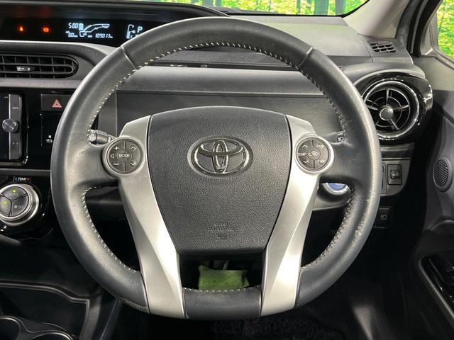 アクア X-アーバン ソリッド バックカメラ 衝突被害軽減システム 禁煙車 ハーフレザーシート スマートキー LEDヘッド ETC 純正16インチアルミ オートハイビーム 車線逸脱警報 オートライト オートエアコン(11枚目)