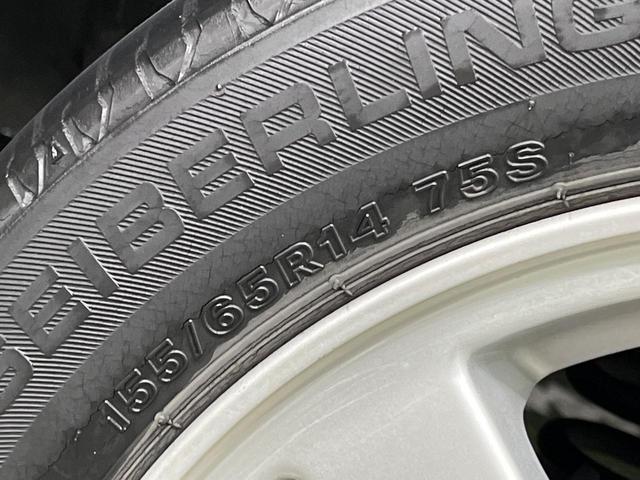 タント カスタムＸリミテッド　電動スライドドア　禁煙車　スマートキー　ＨＩＤヘッド　純正１４インチアルミ　オートエアコン　ＣＤ　電動格納ミラー　プライバシーガラス　盗難防止システム　衝突安全ボディー　トラクションコントロール（25枚目）