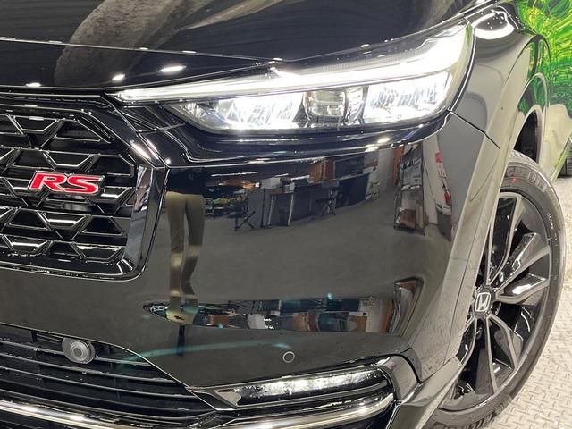 ヴェゼル ｅ：ＨＥＶ　ＲＳ　登録済未使用車　全周囲カメラ　衝突被害軽減システム　禁煙車　電動リアゲート　ハーフレザーシート　コーナーセンサー　スマートキー　ＬＥＤヘッド　ＥＴＣ２．０　純正１８インチアルミ　オートハイビーム（12枚目）