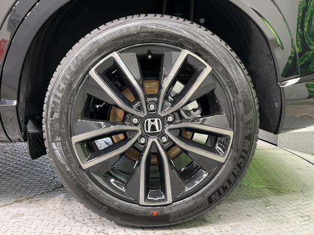 ヴェゼル ｅ：ＨＥＶ　ＲＳ　登録済未使用車　全周囲カメラ　衝突被害軽減システム　禁煙車　電動リアゲート　ハーフレザーシート　コーナーセンサー　スマートキー　ＬＥＤヘッド　ＥＴＣ２．０　純正１８インチアルミ　オートハイビーム（23枚目）