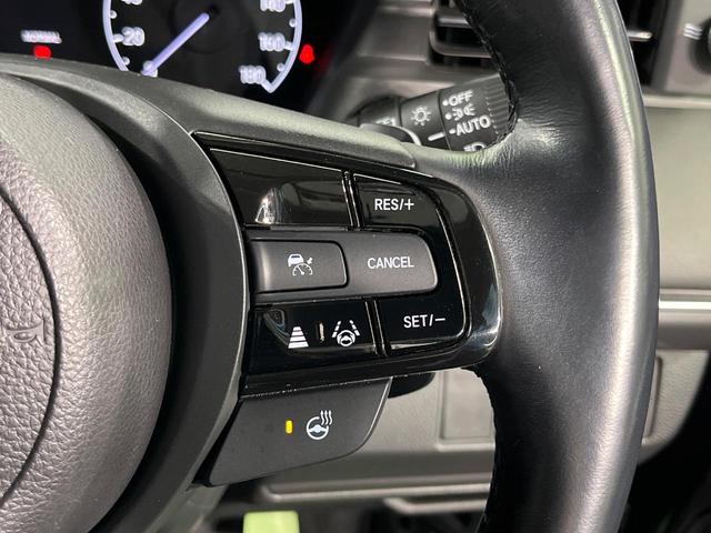 ヴェゼル ｅ：ＨＥＶ　Ｚ　バックカメラ　衝突被害軽減システム　禁煙車　電動リアゲート　ハーフレザーシート　コーナーセンサー　スマートキー　ＬＥＤヘッド　ＥＴＣ２．０　純正１８インチアルミ　オートハイビーム　車線逸脱警報（7枚目）