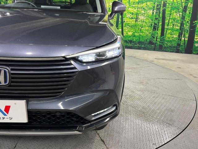 ヴェゼル ｅ：ＨＥＶ　Ｚ　バックカメラ　衝突被害軽減システム　禁煙車　電動リアゲート　ハーフレザーシート　コーナーセンサー　スマートキー　ＬＥＤヘッド　ＥＴＣ２．０　純正１８インチアルミ　オートハイビーム　車線逸脱警報（12枚目）