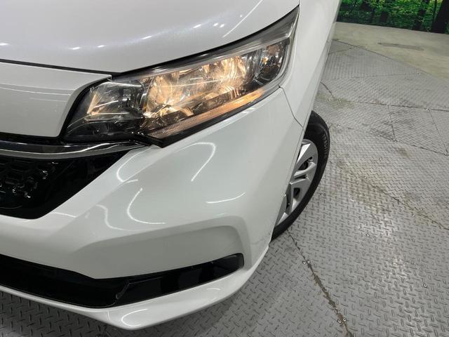 フリード Ｇ・ホンダセンシング　両側電動ドア　純正ＳＤナビ　バックカメラ　衝突被害軽減システム　レーダークルーズ　禁煙車　コーナーセンサー　スマートキー　ビルトインＥＴＣ　車線逸脱警報　オートライト　オートエアコン（13枚目）