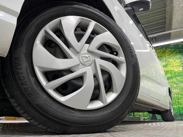 フリード Ｇ・ホンダセンシング　両側電動ドア　純正ＳＤナビ　バックカメラ　衝突被害軽減システム　レーダークルーズ　禁煙車　コーナーセンサー　スマートキー　ビルトインＥＴＣ　車線逸脱警報　オートライト　オートエアコン（14枚目）