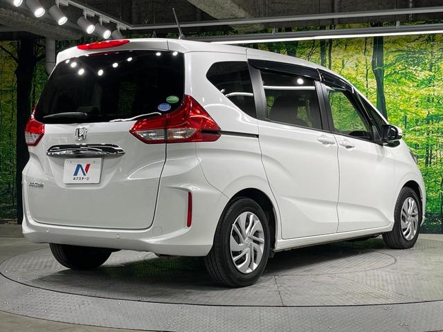 フリード Ｇ・ホンダセンシング　両側電動ドア　純正ＳＤナビ　バックカメラ　衝突被害軽減システム　レーダークルーズ　禁煙車　コーナーセンサー　スマートキー　ビルトインＥＴＣ　車線逸脱警報　オートライト　オートエアコン（18枚目）