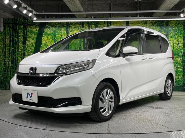 フリード Ｇ・ホンダセンシング　両側電動ドア　純正ＳＤナビ　バックカメラ　衝突被害軽減システム　レーダークルーズ　禁煙車　コーナーセンサー　スマートキー　ビルトインＥＴＣ　車線逸脱警報　オートライト　オートエアコン（63枚目）