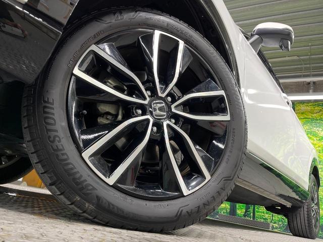 ヴェゼル ｅ：ＨＥＶ　Ｚ　純正９型ナビ　バックカメラ　衝突被害軽減システム　禁煙車　電動リアゲート　ハーフレザーシート　コーナーセンサー　スマートキー　ＥＴＣ２．０　純正１７インチアルミ　オートハイビーム　車線逸脱警報（13枚目）