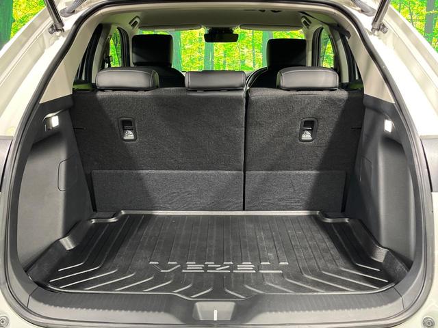 ヴェゼル ｅ：ＨＥＶ　Ｚ　純正９型ナビ　バックカメラ　衝突被害軽減システム　禁煙車　電動リアゲート　ハーフレザーシート　コーナーセンサー　スマートキー　ＥＴＣ２．０　純正１７インチアルミ　オートハイビーム　車線逸脱警報（26枚目）