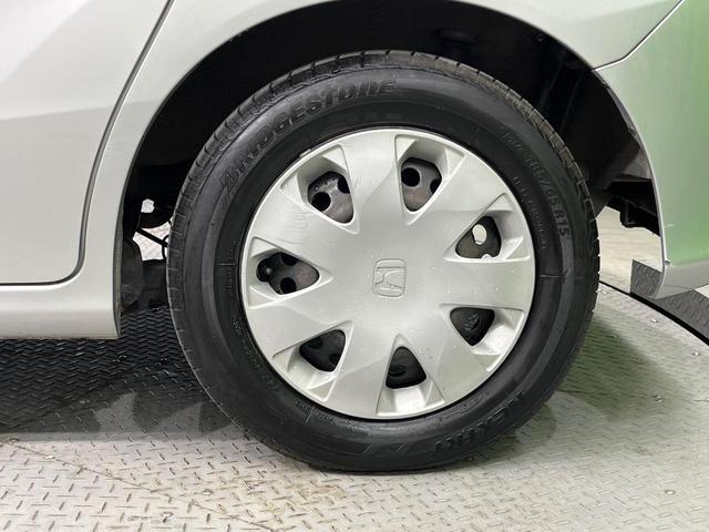 フリード G ジャストセレクション 純正ナビ 電動スライドドア 禁煙車 ドラレコ スマートキー ビルトインETC オートエアコン CD DVD再生 地デジ(57枚目)