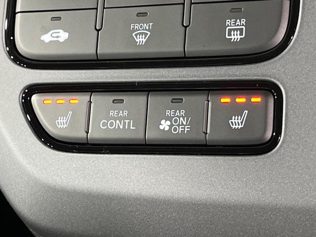 フリード ｅ：ＨＥＶエアー　ＥＸ　登録済未使用車　両側電動ドア　衝突被害軽減システム　コーナーセンサー　スマートキー　ＬＥＤヘッド　純正１５インチアルミ　車線逸脱警報　オートライト　オートエアコン（7枚目）