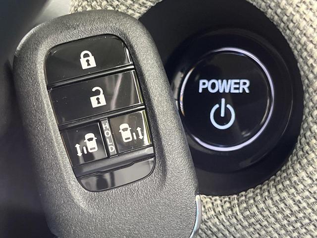 フリード ｅ：ＨＥＶエアー　ＥＸ　登録済未使用車　両側電動ドア　衝突被害軽減システム　コーナーセンサー　スマートキー　ＬＥＤヘッド　純正１５インチアルミ　車線逸脱警報　オートライト　オートエアコン（29枚目）