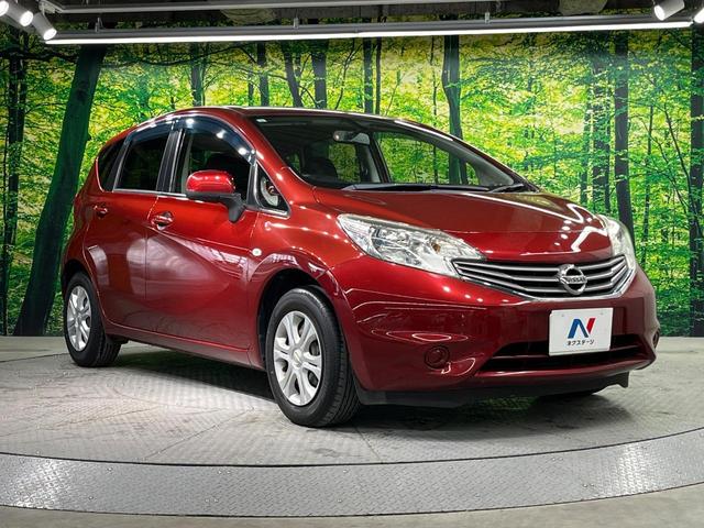 ノート Ｘ　純正ＳＤナビ　バックカメラ　禁煙車　スマートキー　ＨＩＤヘッド　ＣＤ　地デジ　電動格納ミラー　衝突安全ボディ　プライバシーガラス　盗難防止システム　パワーステアリング　パワーウィンドウ（16枚目）