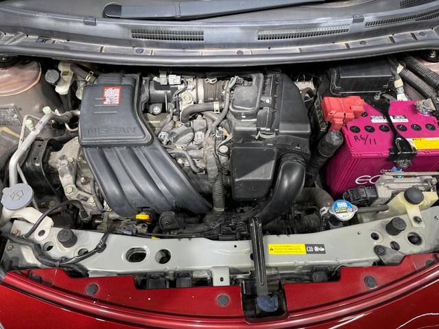 ノート Ｘ　純正ＳＤナビ　バックカメラ　禁煙車　スマートキー　ＨＩＤヘッド　ＣＤ　地デジ　電動格納ミラー　衝突安全ボディ　プライバシーガラス　盗難防止システム　パワーステアリング　パワーウィンドウ（18枚目）