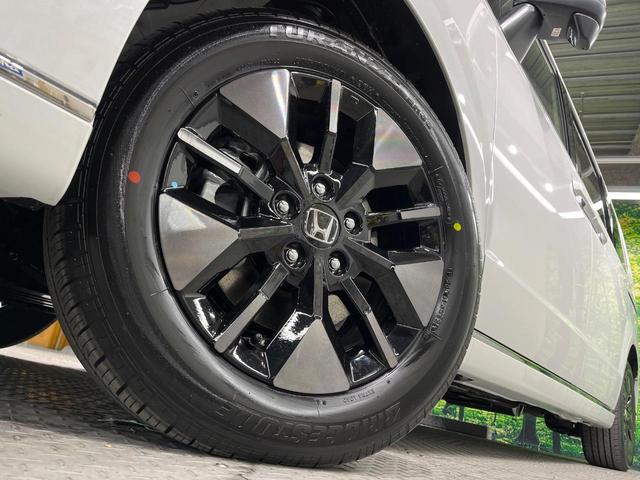 ステップワゴン e:HEVスパーダ 登録済未使用車 純正ナビ 両側電動ドア バックカメラ 衝突被害軽減システム レーダークルーズ 電動リアゲート ハーフレザーシート コーナーセンサー スマートキー LEDヘッド 純正16インチアルミ(13枚目)