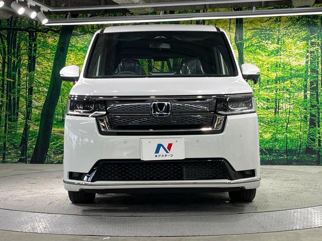 ステップワゴン e:HEVスパーダ 登録済未使用車 純正ナビ 両側電動ドア バックカメラ 衝突被害軽減システム レーダークルーズ 電動リアゲート ハーフレザーシート コーナーセンサー スマートキー LEDヘッド 純正16インチアルミ(14枚目)