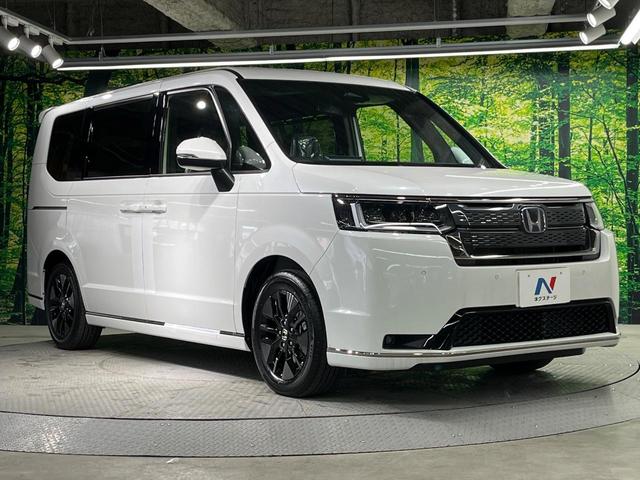 ステップワゴン e:HEVスパーダ 登録済未使用車 純正ナビ 両側電動ドア バックカメラ 衝突被害軽減システム レーダークルーズ 電動リアゲート ハーフレザーシート コーナーセンサー スマートキー LEDヘッド 純正16インチアルミ(16枚目)