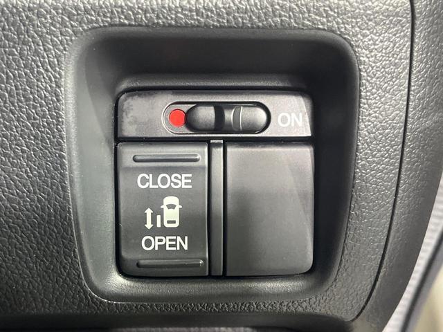 Ｎ－ＢＯＸカスタム Ｇ・Ｌパッケージ　電動スライドドア　純正ＳＤナビ　バックカメラ　禁煙車　ハーフレザーシート　スマートキー　ＨＩＤヘッド　ＥＴＣ　純正１４インチアルミ　オートライト　オートエアコン　Ｂｌｕｅｔｏｏｔｈ　ＤＶＤ再生（5枚目）