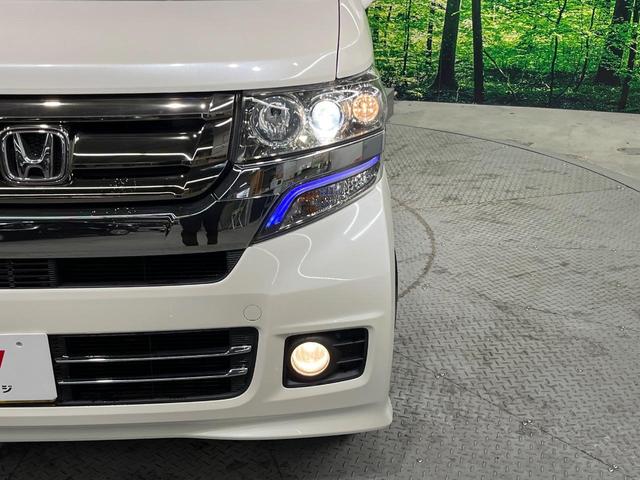 Ｎ－ＢＯＸカスタム Ｇ・Ｌパッケージ　電動スライドドア　純正ＳＤナビ　バックカメラ　禁煙車　ハーフレザーシート　スマートキー　ＨＩＤヘッド　ＥＴＣ　純正１４インチアルミ　オートライト　オートエアコン　Ｂｌｕｅｔｏｏｔｈ　ＤＶＤ再生（12枚目）
