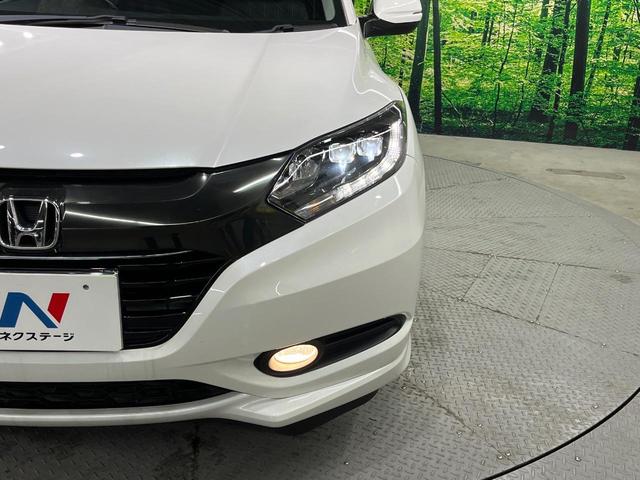 ヴェゼル ハイブリッドＺ　純正ＳＤナビ　バックカメラ　衝突被害軽減システム　ハーフレザーシート　スマートキー　ＬＥＤヘッド　ＥＴＣ　クルコン　純正１７インチアルミ　オートライト　オートエアコン　Ｂｌｕｅｔｏｏｔｈ　ＣＤ（12枚目）