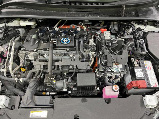 カローラツーリング ハイブリッド ダブルバイビー 10型ナビ バックカメラ 衝突被害軽減システム レーダークルーズ 禁煙車 ハーフレザーシート スマートキー LEDヘッド ETC2.0 純正17インチアルミ オートハイビーム オートライト(18枚目)