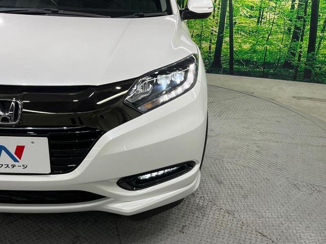 ヴェゼル ハイブリッドZ・ホンダセンシング 純正SDナビ バックカメラ 衝突被害軽減システム 禁煙車 ハーフレザーシート ドラレコ コーナーセンサー スマートキー LEDヘッド ビルトインETC 純正17インチアルミ 車線逸脱警報(12枚目)