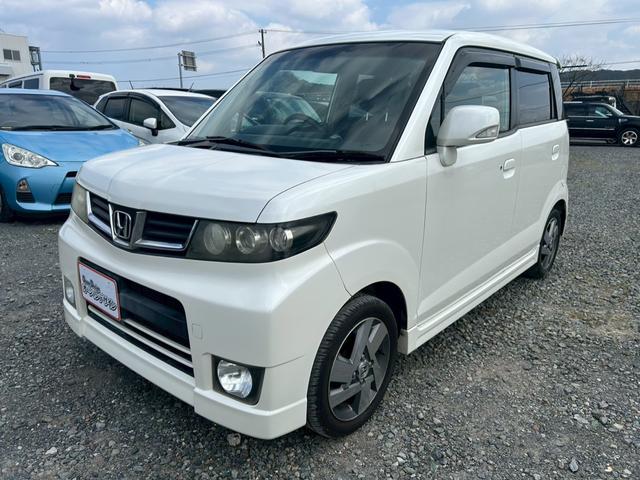 ゼストスパーク Ｗ　Ｂカメラ　運転席助手席エアバック　ＥＴＣ付き　電格ミラー　ＳＤ　スマートキー付　パワーウインド　ＤＶＤ再生可能　キーフリー　ワンセグテレビ　エアコン　パワーステアリング　横滑り防止装置　ＡＢＳ　ＵＳＢ（11枚目）