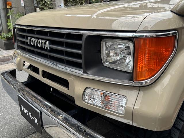 ランドクルーザープラド SXワイド サンドベージュXホワイト ナロー5ナンバー8人乗り ナルディーステア リフトアップ 70メッキバンパー 社外オーディオ ETC ドライブレコーダー バックカメラ 黒革調シートカバー ジオランダーAT(13枚目)