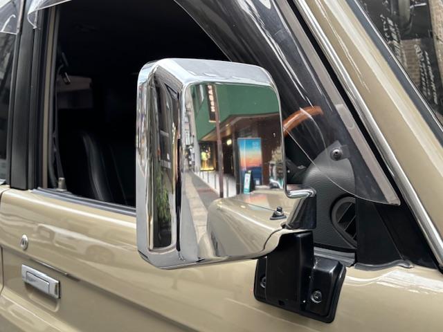 ランドクルーザープラド SXワイド サンドベージュXホワイト ナロー5ナンバー8人乗り ナルディーステア リフトアップ 70メッキバンパー 社外オーディオ ETC ドライブレコーダー バックカメラ 黒革調シートカバー ジオランダーAT(16枚目)