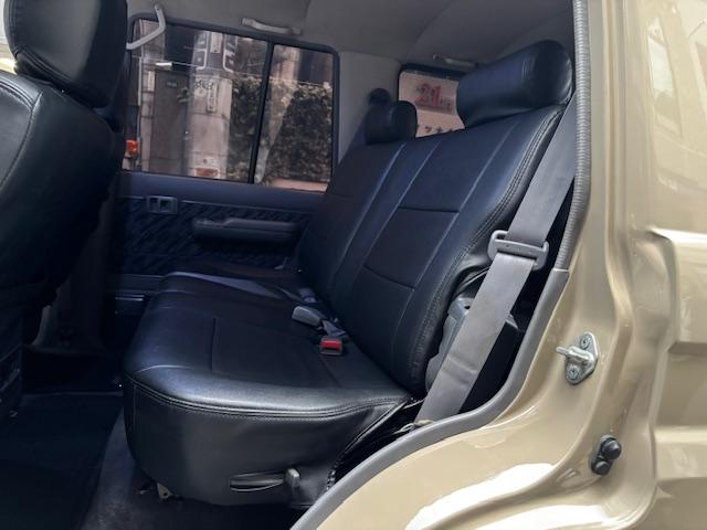 ランドクルーザープラド SXワイド サンドベージュXホワイト ナロー5ナンバー8人乗り ナルディーステア リフトアップ 70メッキバンパー 社外オーディオ ETC ドライブレコーダー バックカメラ 黒革調シートカバー ジオランダーAT(34枚目)