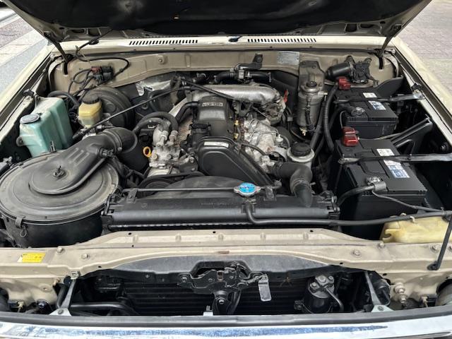 ランドクルーザープラド SXワイド サンドベージュXホワイト ナロー5ナンバー8人乗り ナルディーステア リフトアップ 70メッキバンパー 社外オーディオ ETC ドライブレコーダー バックカメラ 黒革調シートカバー ジオランダーAT(52枚目)