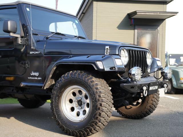ジープ・ラングラー スポーツ 6速MT/リフトアップ/社外16インチAW/Bfgoodrichタイヤ/社外フロント・リアバンパー/社外オーバーフェンダー(23枚目)