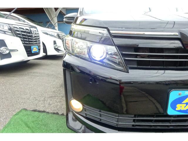 ヴォクシー ハイブリッドＶ　ＳＤナビ　地デジ　Ｂカメラ　１１型後席モニター　Ｂｌｕｅｔｏｏｔｈ　衝突被害軽減　車線逸脱防止　クルーズコントロール　シートヒーター　７人乗りウォークスルー　ＡＷ　両側自動ドア　全国対応２年保証（34枚目）