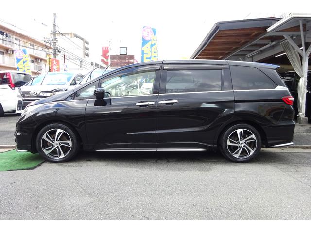 オデッセイ アブソルート・Ｘホンダセンシング　ＳＤナビ　地デジ　Ｂカメラ　後席モニター　ＢＴ　アダプティブクルコン　衝突被害軽減　車線逸脱防止　ハーフレザーＰシート　７人乗りオットマン　ＬＥＤライト　スマートキー　両側自動ドア　全国対応２年保証（3枚目）