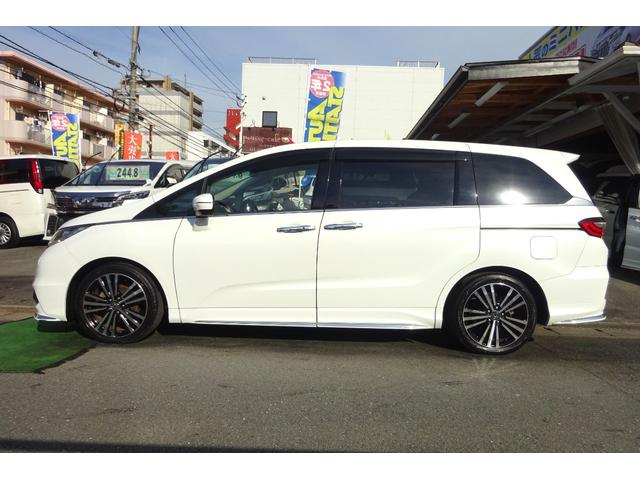 オデッセイ アブソルート・ＥＸホンダセンシング　ＳＤナビ　地デジ　Ｂカメラ　後席モニター　衝突被害軽減　車線逸脱防止　アダプティブクルコン　ＢＳＭ　ハーフレザーパワーシート　７人乗オットマン　ＵＳＢポート　１８ＡＷ　両側自動ドア　全国対応２年保証（3枚目）